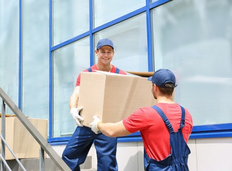 Team organising furniture and boxes during a Southhornchurch move