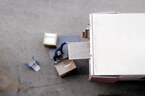 Packed boxes and furniture prepared for short-term storage in Southhornchurch