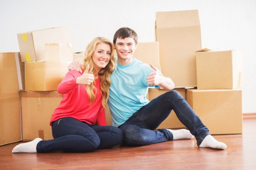 Efficient man and van service preparing items for safe delivery